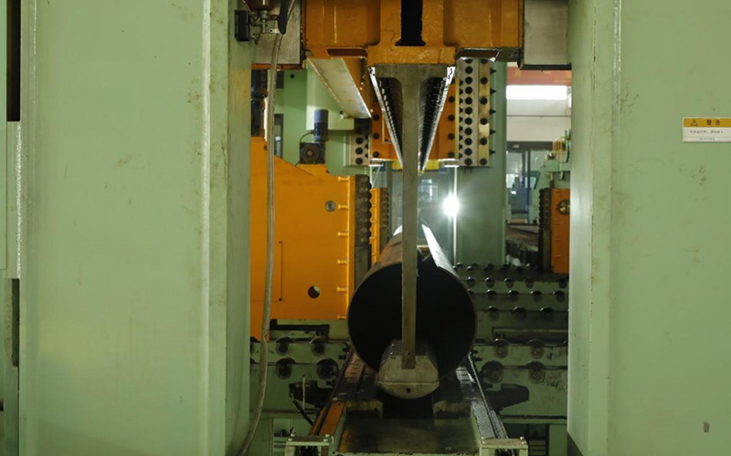 api5l lsaw steel pipe jcoe alt jcoe lsaw steel pipe manufacturing stage showing steel plate bent into o shape banner