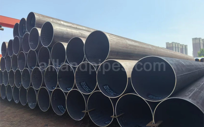 ASTM A252 LSAW straight seam steel pipe piles stacked for driven deep foundation bridge and marine construction projects banner
