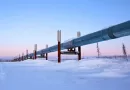 Large diameter API 5L line pipe system transporting oil across snowy terrain, demonstrating high resilience in extreme cold environments-banner