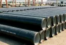 Large inventory of AS/NZS 1579 compliant DN1200 SSAW steel water pipes with cement mortar lining and black external coating, manufactured by Allland in China.-banner
