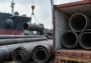 Large diameter LSAW and SSAW steel pipes loaded in shipping containers at a seaport using nested loading=