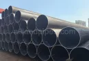 ASTM A252 LSAW straight seam steel pipe piles stacked for driven deep foundation bridge and marine construction projects banner